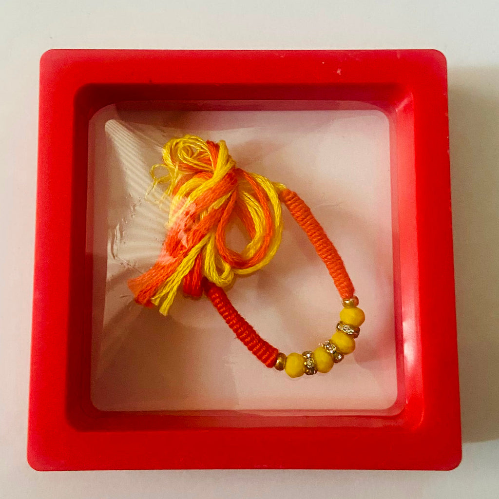 Saffron Yellow Traditional Beads Rakhi