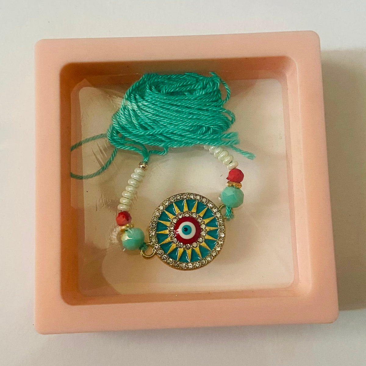 Turquoise Evil Eye Designer Rakhi
