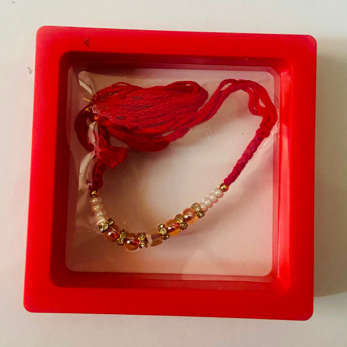 Ruby Crystal Pearl Rakhi