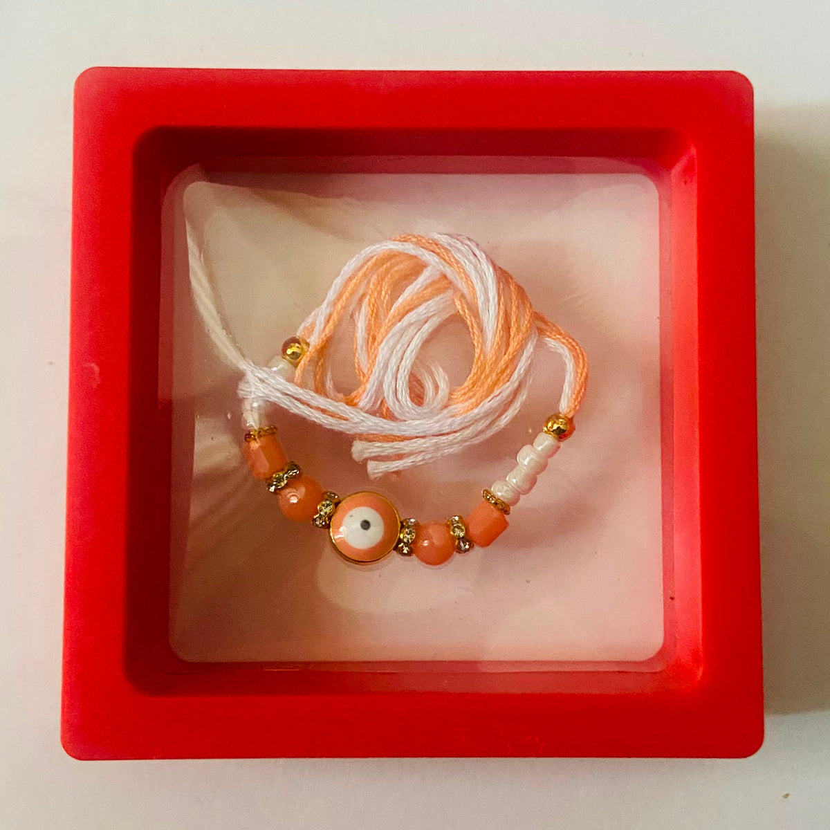 Peach Evil Eye Protection Rakhi