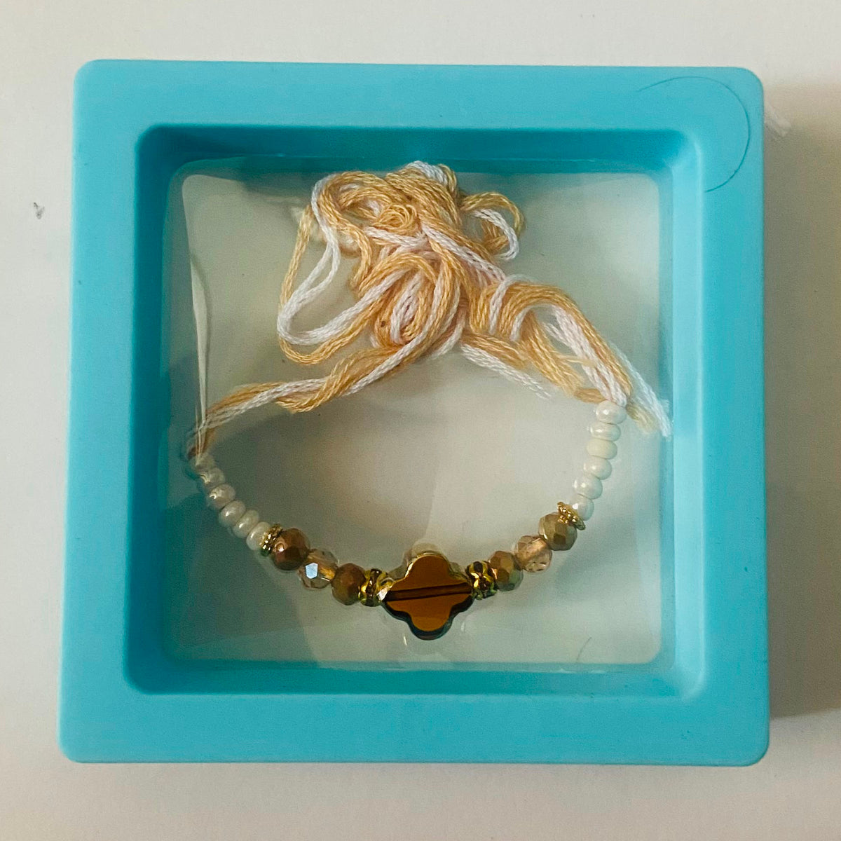 Golden Clover Crystal Rakhi