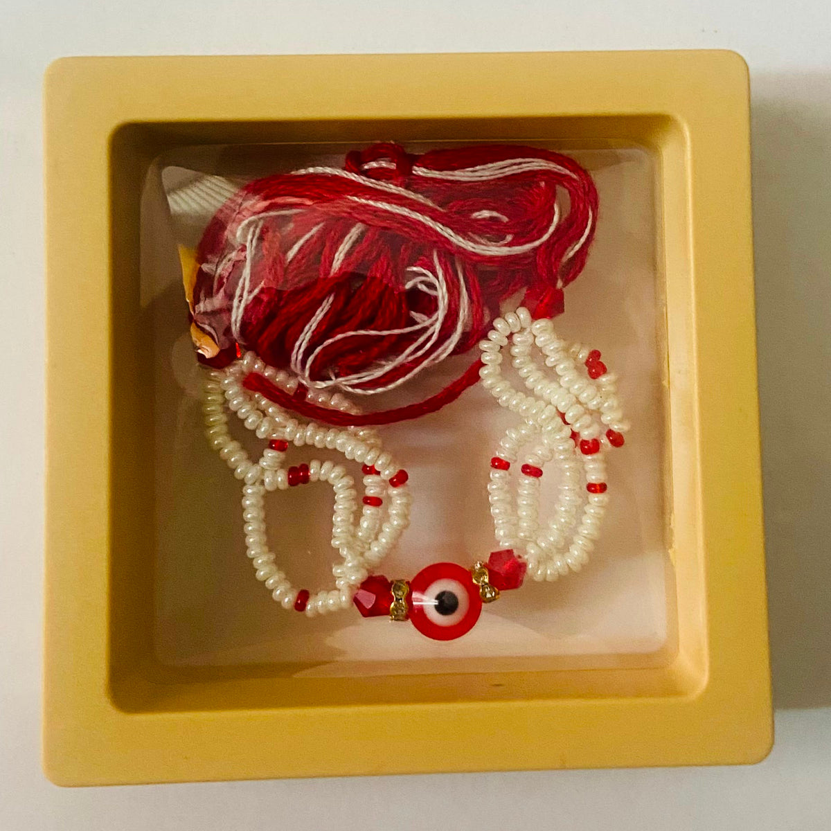Evil Eye Pearl Handcrafted Rakhi